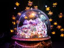The giant snow globe in the Ice Palace on the Jungfrau Joch, surrounded by glowing stars.