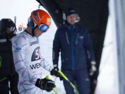 A snapshot from the Lauberhorn Race in Wengen. The next skier is getting ready for the downhill run in the starting gate.