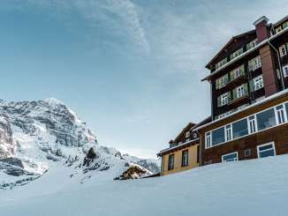 The Hotel Bellvue des Alpes is located on the snow-covered Kleine Scheidegg. The Eiger can be seen in the background.