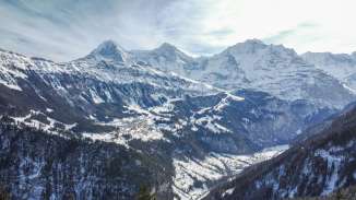 A view of the Lauterbrunnen Valley, Wengen, and the "Three Peaks"—the Eiger, Mönch, and Jungfrau.