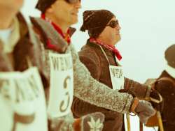 A nostalgic photo of the Lauberhorn Race in Wengen. The skiers are checking the slope conditions and waiting for the start.
